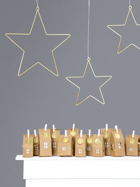 Adventkalender Huisjes van Partydeco koop je bij Partywinkel