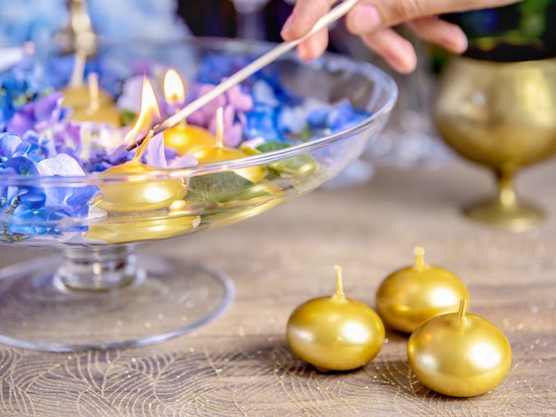 Drijfkaarsen Goud 4cm 50st van Partydeco koop je bij Partywinkel