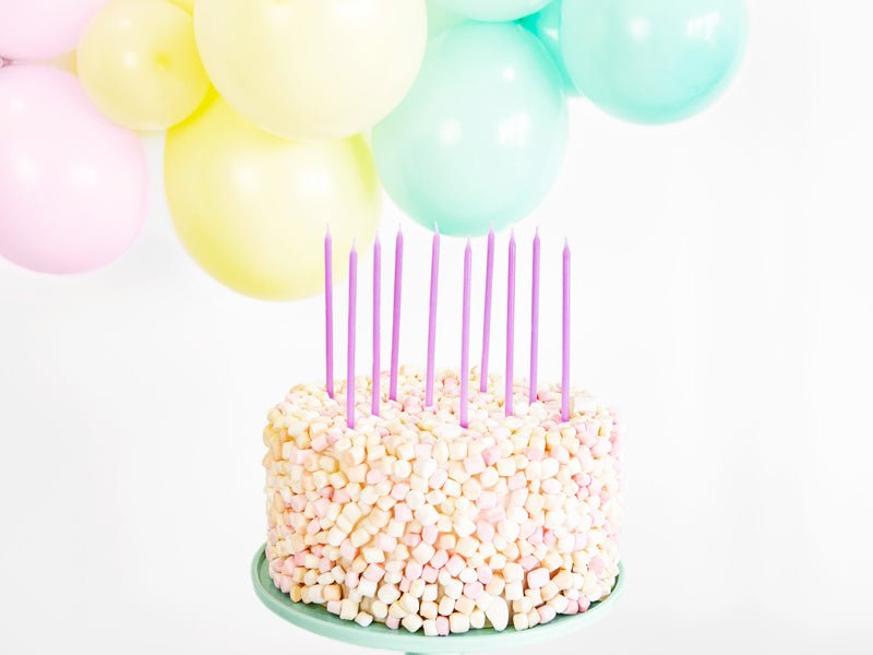 Lila Kaarsen 14cm 12st van Partydeco koop je bij Partywinkel