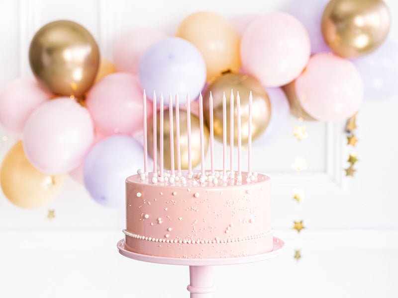 Roze Kaarsen 14cm 12st van Partydeco koop je bij Partywinkel